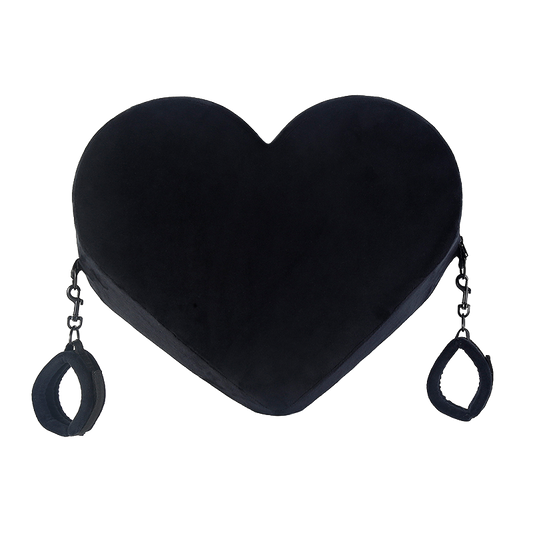 Black heart-shaped pillow with cuffs on both sides