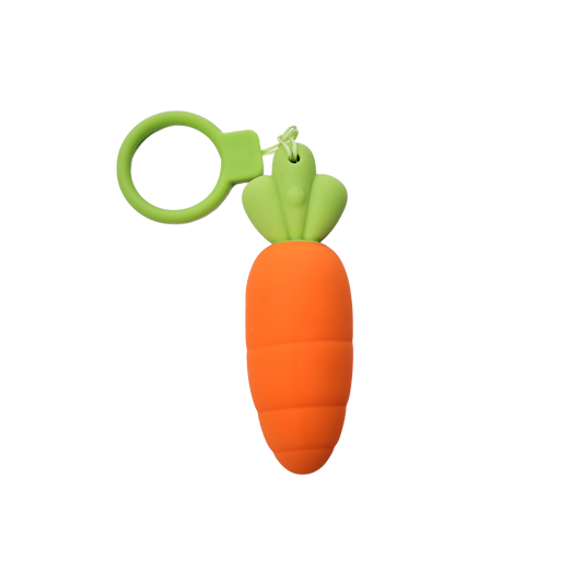 Carrot-shaped bullet vibrator with a green top on a white background